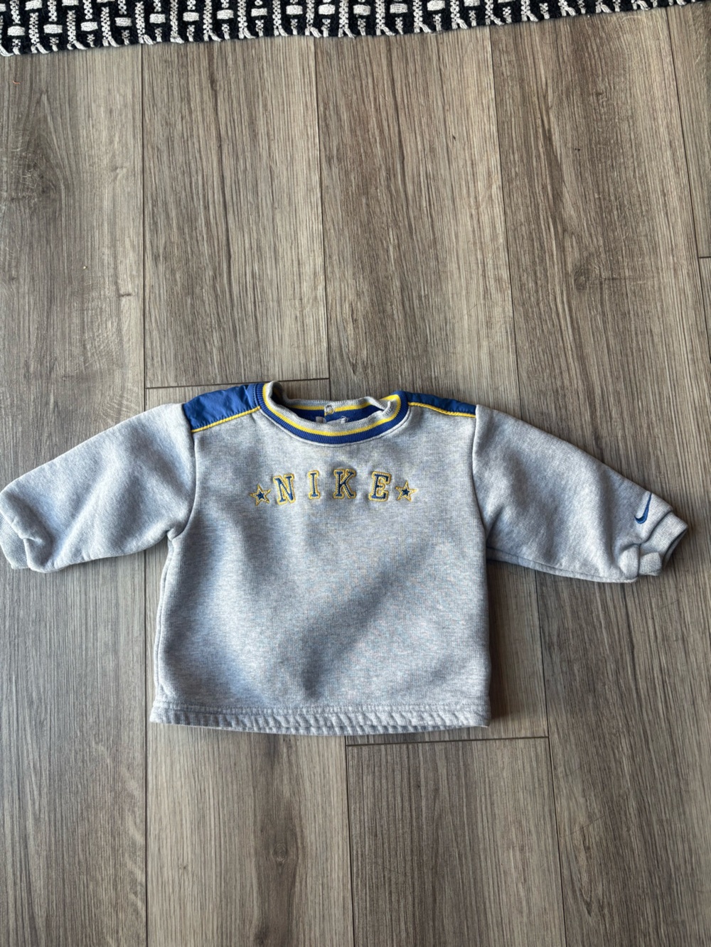 Nike Kids Grey Sweatshirt with Blue and Yellow Accents